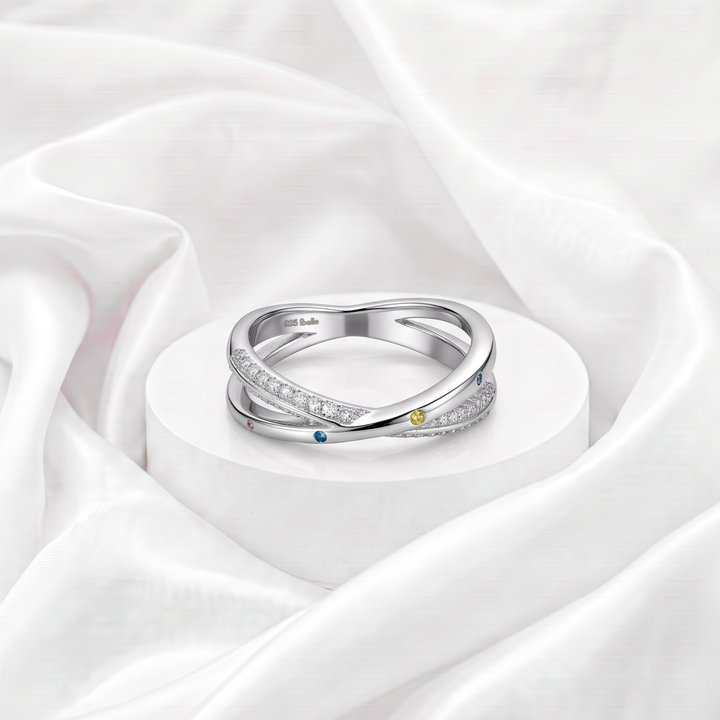 Anillo de bandas cruzadas con pavé blanco y circonias multicolores para mujer marca Belle en plata 925 rodinada.