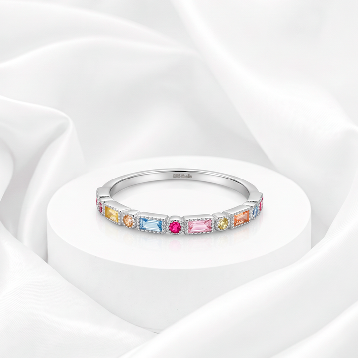 Churumbela Art Déco arcoíris en corte baguette y redondo con circonias multicolores para mujer marca Belle en plata 925 rodinada.