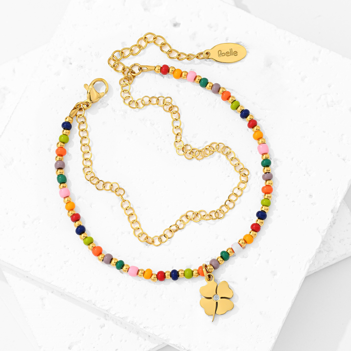 Pulsera Acero en Baño de Oro Blanco Trébol de Colores